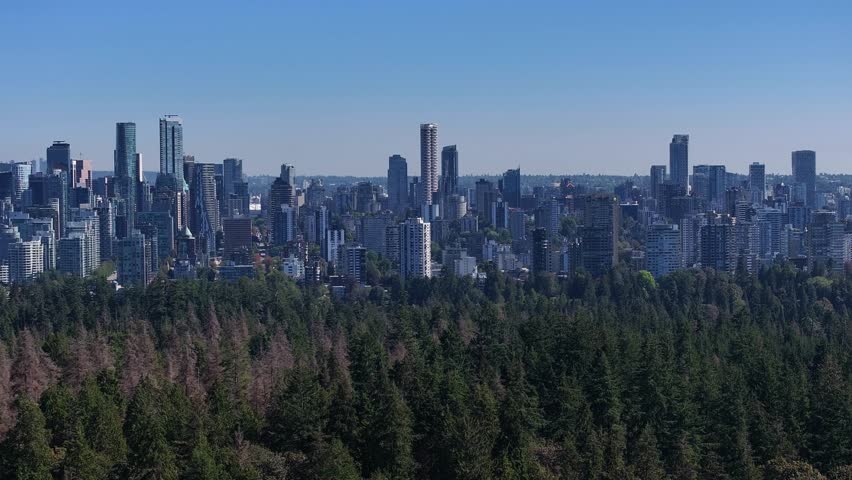 Vancouver skyline as seen from Stanley Park - aerial view of the downtown skyscrapers. 