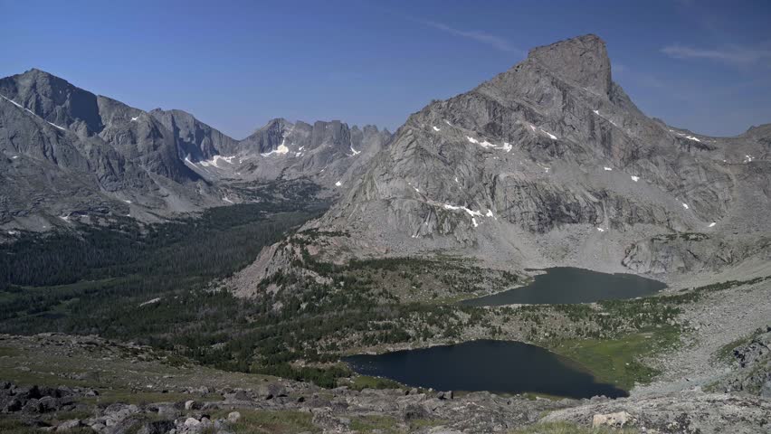 Dramatic static view of Lizard Head Peak, highlighting the rugged landscape and surrounding mountains in Wyoming’s Wind River Range