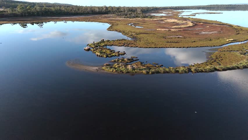 The water and islands of the Moulting Lagoon Game Reserve in Coles Bay. Tasmania, Australia.