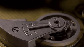 Clockwork mechanism works with spring and cogs. Concept of time and deadline, successful business or teamwork. Details of watch - Powered by Shutterstock - Get 15% off with code: PIKWIZARD15