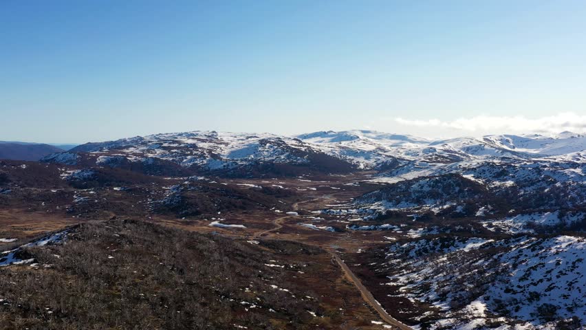 Wide aerial panorama of Perisher valley in Snowy Mountains of Australia aerial 4k.
