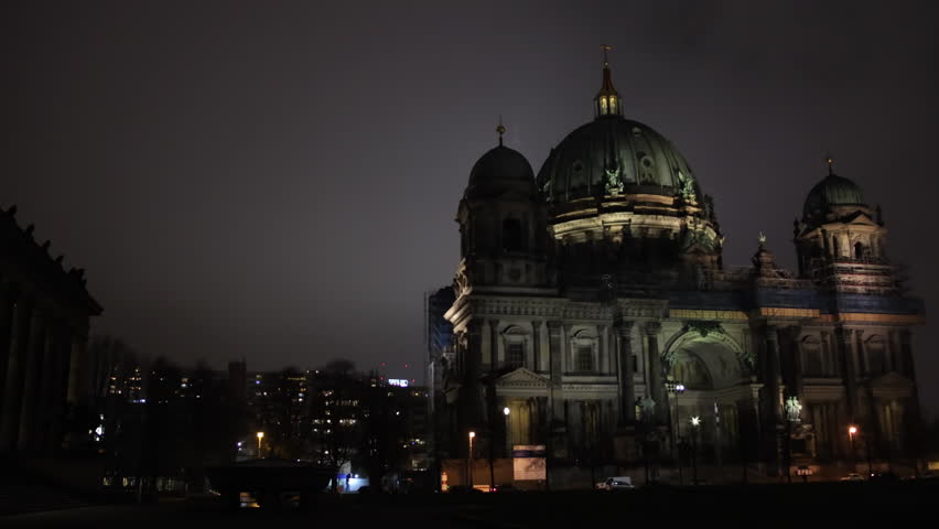 Berlin Cathedral, Berlin Landmark, Historic Landmark. Night sky serves as dramatic backdrop for illuminated Berlin Cathedral.