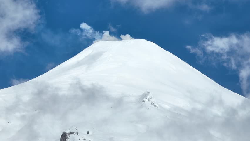 Villarrica Volcano At Pucon Los Lagos Chile. Volcano Showcasing The Raw Power And Beauty Of Nature. Nature Travel Snow Covered Forest Trees. Nature Exterior Aerial View. Pucon Los Lagos.