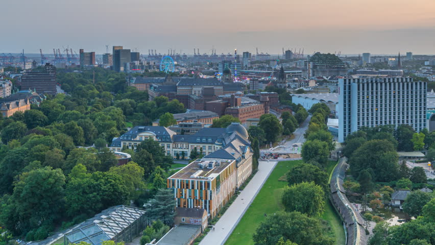 View over Hamburg city skyline time lapse from day to night, hamburg panorama germany.