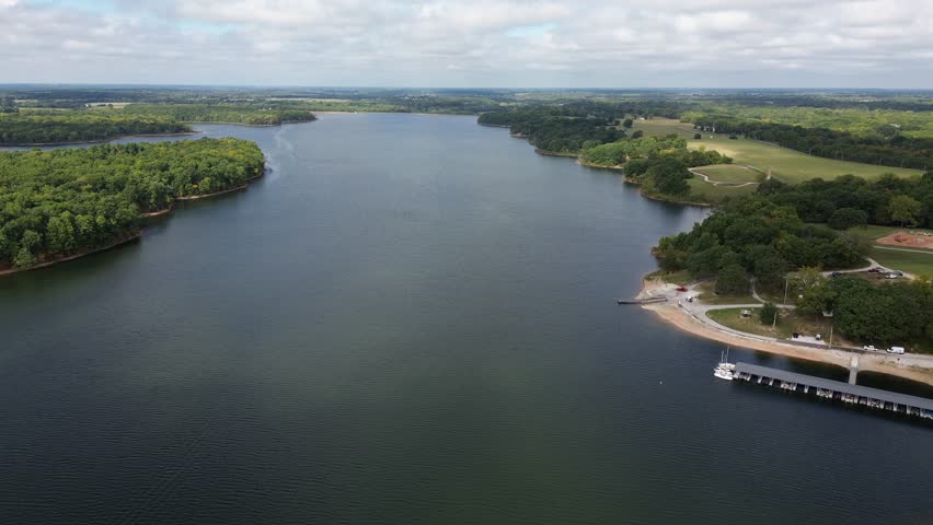 Fellows Lake, located in Springfield, Missouri, is a serene and picturesque reservoir nestled in the Ozarks. Surrounded by lush forests and rolling hills, the lake offers a stunning natural backdrop.