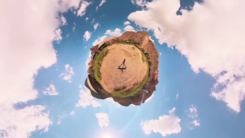 A tourist makes a trip around the world using a 360-degree panoramic camera. 