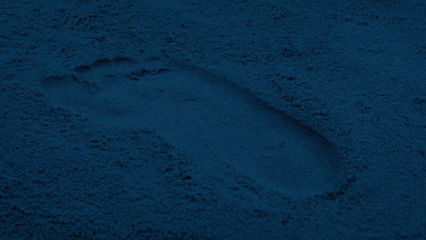 Foot Print In The Sand At Dusk