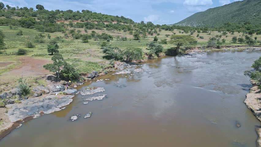 Aerial view of a African serene river in a lush, Amboseli National Park, Kenya