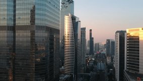 Modern office building with transport road downtown Silom Sathorn city Bangkok Thailand aerial view - Powered by Shutterstock - Get 15% off with code: PIKWIZARD15