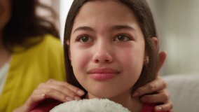 Close up suffering sad crying bad feeling Caucasian little girl kid daughter tears schoolgirl stress violence at home abuse mental health problems ignoring mother female woman calming comforting child - Powered by Shutterstock - Get 15% off with code: PIKWIZARD15