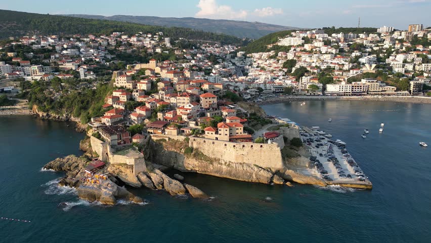 Drone flies around the Old Town in Ulcinj at sunset