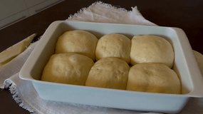 Raw hot cross buns in a baking pan - Powered by Shutterstock - Get 15% off with code: PIKWIZARD15