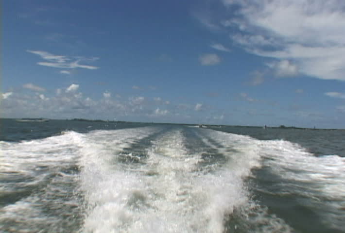 Florida yacht wake in Atlantic Ocean.