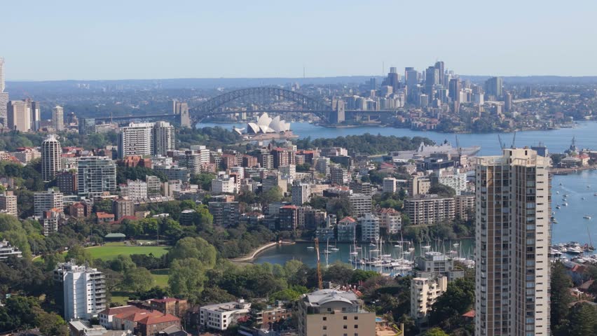 Aerial drone view above Paddington looking toward Rushcutters Bay and Elizabeth Bay in East Sydney, NSW Australia with Sydney City in the background on a sunny day in September 2024