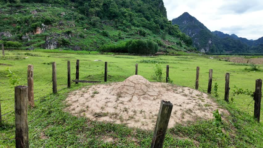 Quang Binh countryside landscape with cultural customs of ethnic minority, circular tomb as hat shape from concrete to burial deceased, mountain view at Tu Lan village, Viet Nam