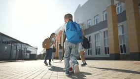 children with backpacks walking to school. kids enjoying school day. Children playing before class. education journey for children. kids with backpacks heading school. Children learning through play. - Powered by Shutterstock - Get 15% off with code: PIKWIZARD15