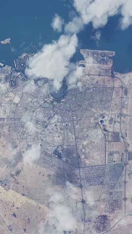 3D - High altitude daytime aerial view of the city of Doha in Qatar