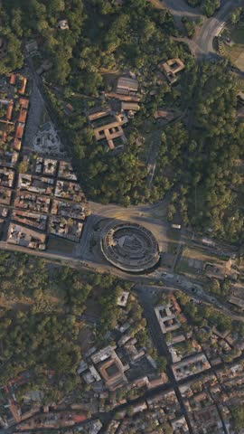 3D - Aerial top view at sunset of the Colosseum in the city of Rome. Italy