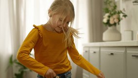 Happy little girl dancing dancer fun rhythmically moving hobby entertainment holidays preschool child daughter music pastime kid schoolgirl childish active smile home weekend preteen jumping energetic - Powered by Shutterstock - Get 15% off with code: PIKWIZARD15