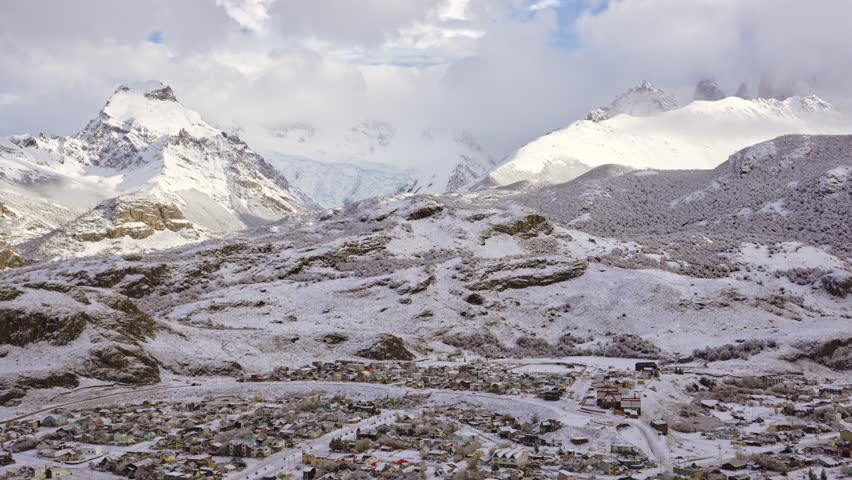 Snow-covered village nestled in the mountains during winter in El Chaltén, Argentina