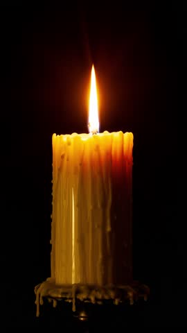Time Lapse of a large candle burning and melting
