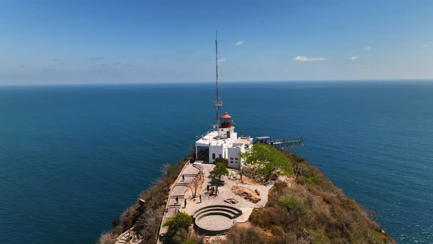 Aerial view orbiting the lighthouse on Isla El Crestón, in sunny Mazatlan, Mexico
