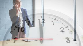 Animation of clock moving over caucasian businesswoman talking on smartphone in office. Business and digital interface concept digitally generated video. - Powered by Shutterstock - Get 15% off with code: PIKWIZARD15