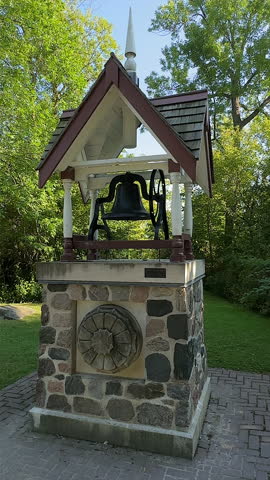 Pan of a small bell structure in Guild Park and Gardens, a renowned public park in Toronto, Canada. (NO AUDIO)