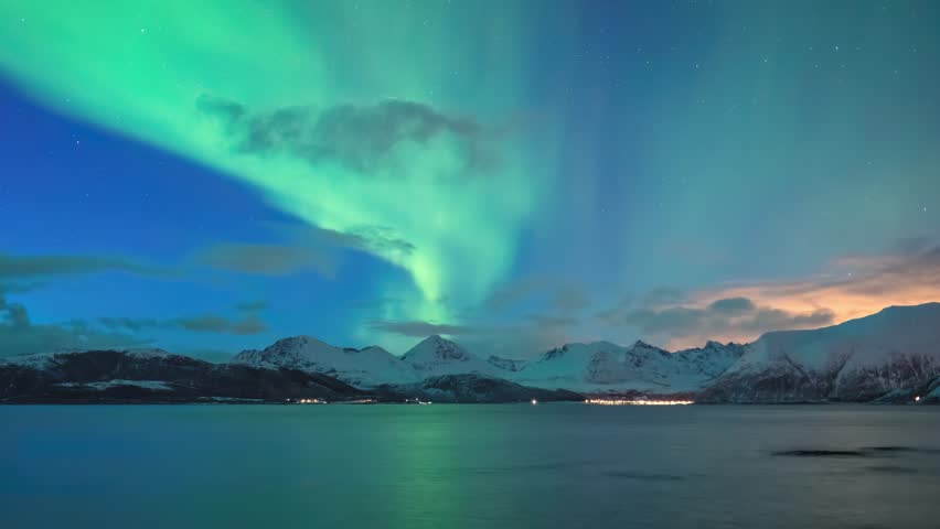 Tromso Norway time lapse of the aurora borealis northern lights winter landscape at Rorvikneset Sommaroy