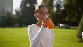 Little girl ethnic latino american child teenager primary student drinking orange juice school break education young daughter schoolgirl outdoor drink healthy beverage children healthcare kid smiling - Powered by Shutterstock - Get 15% off with code: PIKWIZARD15