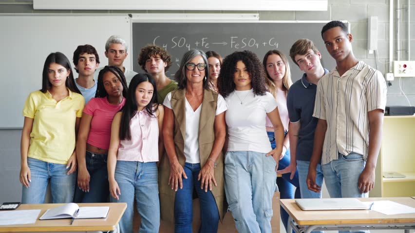 Group portrait of multi-cultural high school students with senior female teacher at classroom ready to start college university - Diversity in Education  - Powered by Shutterstock - Get 15% off with code: PIKWIZARD15