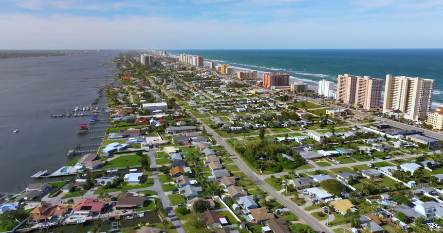 Daytona Beach, Florida. Coastal city in southern USA on Atlantic ocean shore. Aerial view of wealthy waterfront neighborhood.