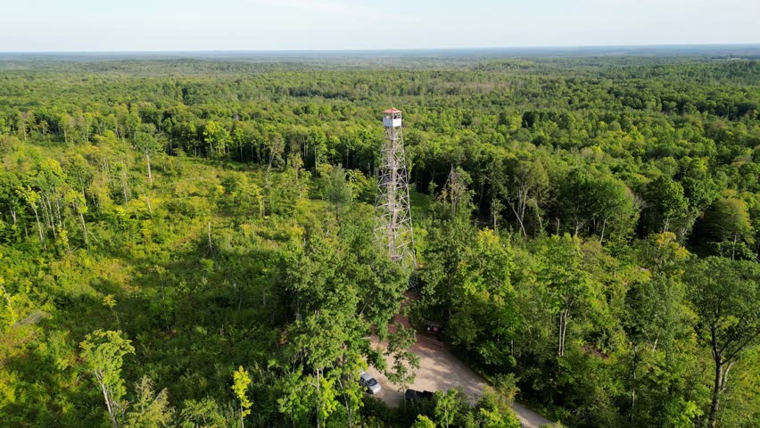 Tourists Enjoying The Spectacular Views Of The Nicolet National Forest From The Top Of The Mountain Lookout Tower In Mountain, Wisconsin.