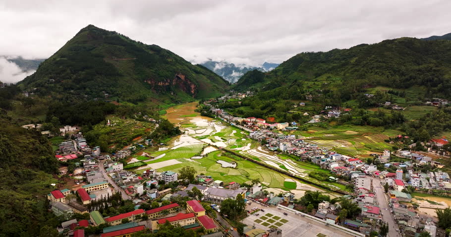 Aerial view of the Don Cao French Fortress in Dong Van, Vietnam, capturing the historic site surrounded by mountains