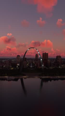 3D - The Gateway Arch - Aerial view at dusk of the city of St. Louis. Mississippi River in Missouri. United States