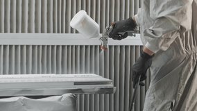 Spray Painting in an Industrial Setting, Close Up of White Paint Being Applied to a Component, Capturing the Precision and Technique in Slow Motion - Powered by Shutterstock - Get 15% off with code: PIKWIZARD15