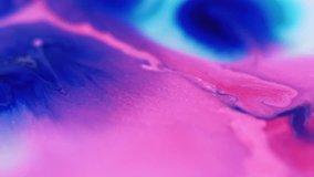 Paint splash. Fluid spill. Defocused neon pink blue color gradient emulsion texture acrylic liquid mix wave flow motion abstract art background. - Powered by Shutterstock - Get 15% off with code: PIKWIZARD15