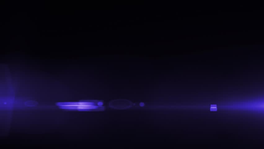 Purple optical lens flare explosion and moving on black background in slow motion 4k footage, abstract flares animation, lens flare footage, optical flares footage