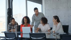 Clock animation over diverse business team discussing project in modern office. Teamwork, brainstorming, collaboration, corporate, innovation, technology - Powered by Shutterstock - Get 15% off with code: PIKWIZARD15