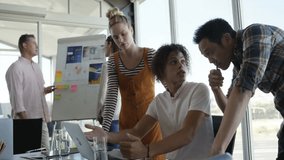 Clock animation over diverse business team collaborating on project in office. Teamwork, collaboration, brainstorming, corporate - Powered by Shutterstock - Get 15% off with code: PIKWIZARD15