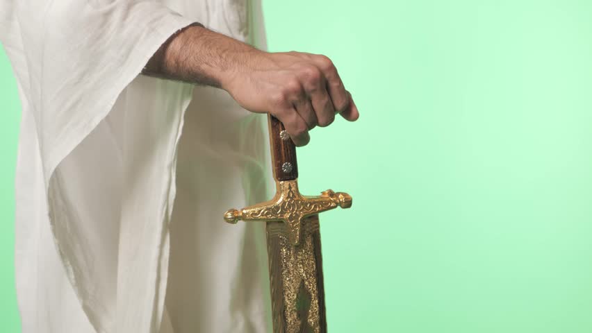 Traditional Saudi out-feet on chromakey. Arabian long saber - saif.