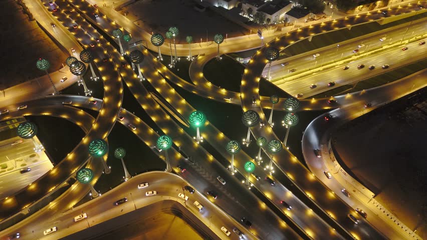 Drone view of busy motorway The Green Field Riyadh KSA. Night.
