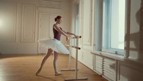 Beautiful ballerina in classic interior of ballet class, exercising at barre. Graceful and slender lady in white tutu and pointe shoes, art and beauty of female body, delightful ballet dancer woman - Powered by Shutterstock - Get 15% off with code: PIKWIZARD15