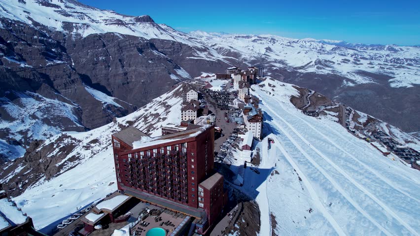 Valle Nevado Ski Station At Andes Mountains Santiago Chile. Aerial View Of A Ski Resort Nestled In The Snowy Mountains. Outdoor Travel Destinations Andes Glacier. Sky Andes Aerial Landscape.