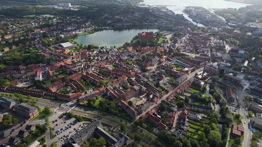 Aerial panorama around the old town of the city Kolding on a sunny summer day in the Denmark