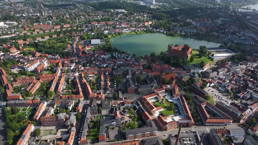 Aerial panorama around the old town of the city Kolding on a sunny summer day in the Denmark