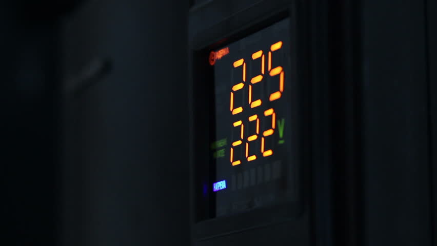Digital timer countdown on UPS device, normal voltage.