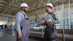 Multiracial engineers handshake success in windows factory. The concept of production of window - Powered by Shutterstock - Get 15% off with code: PIKWIZARD15