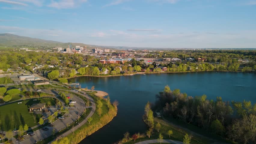 Ponds and rivers in the foreground with Downtown Boise in the backdrop.
