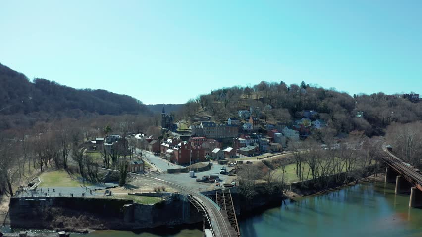 Drone rises above to establish Harpers Ferry West Virginia during sticks season leaves off with historic downtown